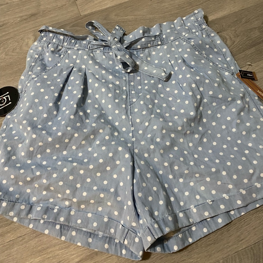 Paperbag waist style. Elastic waist . Polka dot light blue shorts